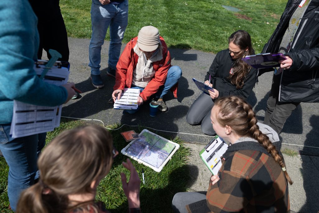 Volunteers learn Molt Search protocols at a training.