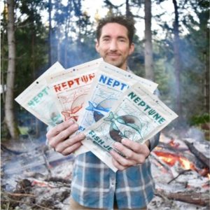 Nick Mendoza holds up packets of his company's fish jerky.
