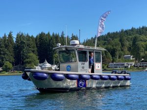 A mobile pumpout boat on the water.