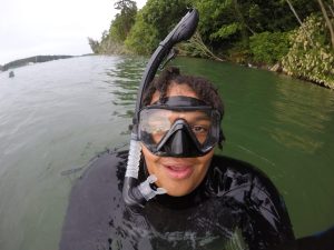Vashon Nature Center high school marine science intern Phoenix Moore takes a selfie before starting his snorkel survey to measure fish use of the Dockton Park beach restoration site on Vashon Island.