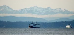 Ferries in Puget Sound with the Olympic Mountains in the background