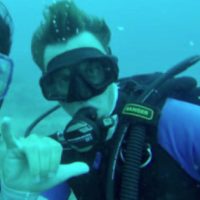 Sam Cheplick underwater in scuba gear