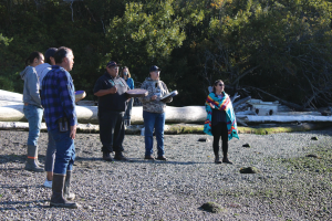 Swinomish Indian Tribal Community bless the site on Kiket Island where they plan to build a clam garden.