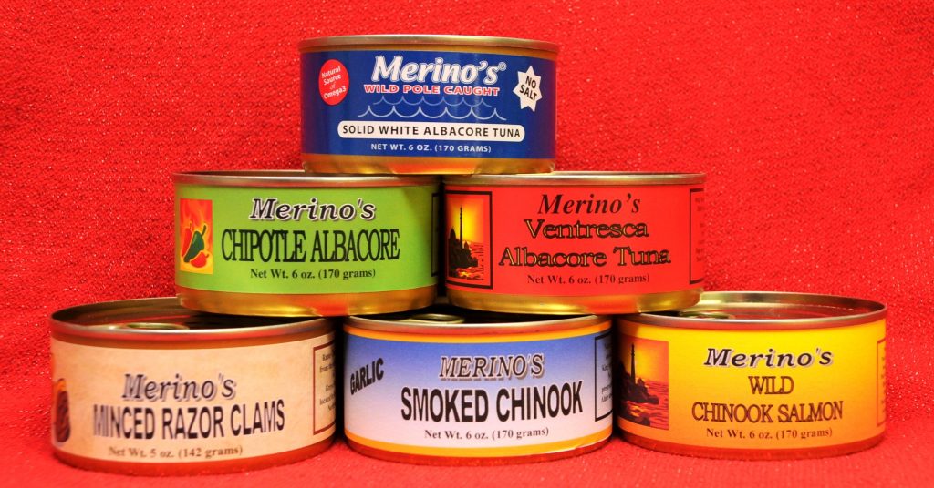 Cans of various Merino's seafood products