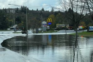 Flooding near the Thriftway in Raymond, 2021
