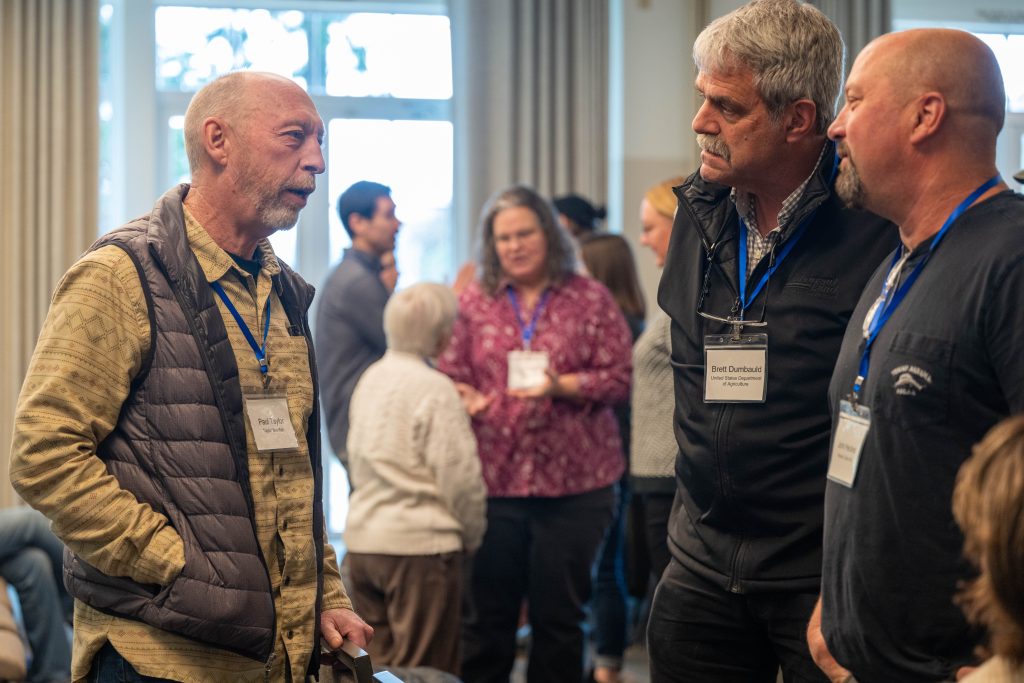 Shellfish Growers Conference attendees in conversation